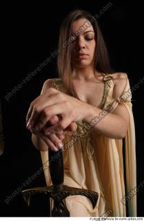 05 2018 01 BARBORA KNEELING POSES WITH SWORD